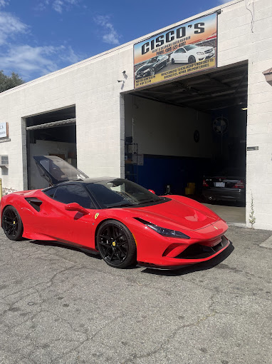 car in front of shop